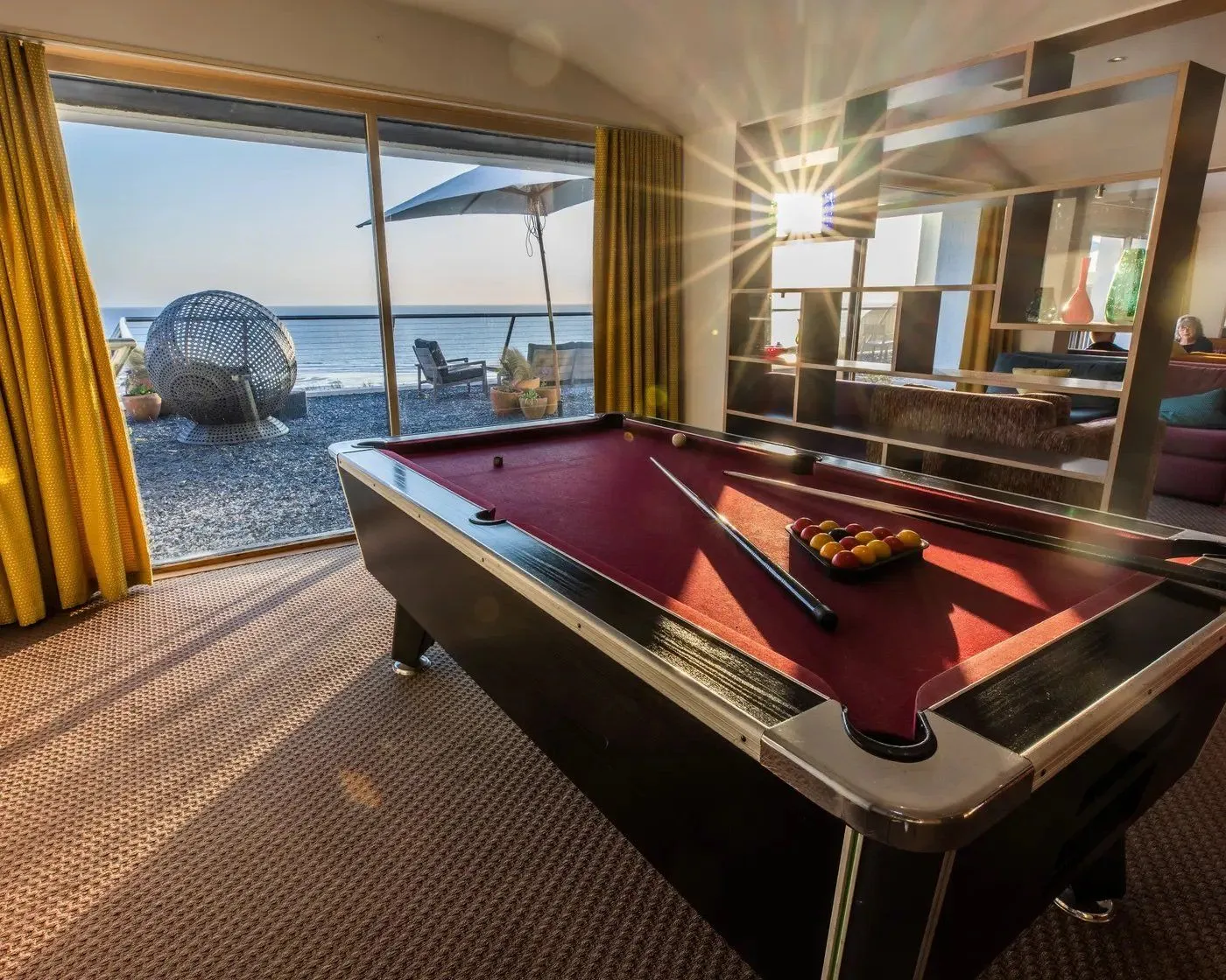 Pool table with a view over the Cornish coast